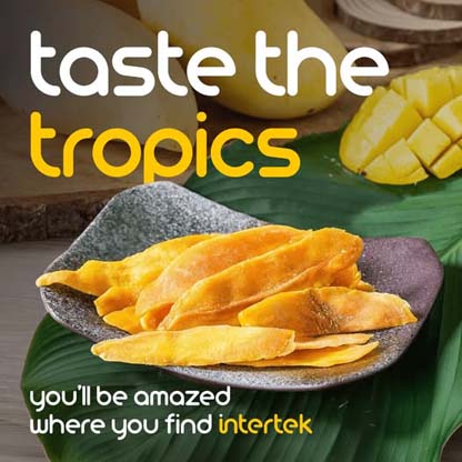 A bowl of dried mango with fresh cut mango in the background