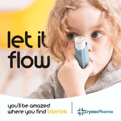 A young girl using an inhaler